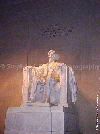 Lincoln Statue (angle view with text on wall above) at night